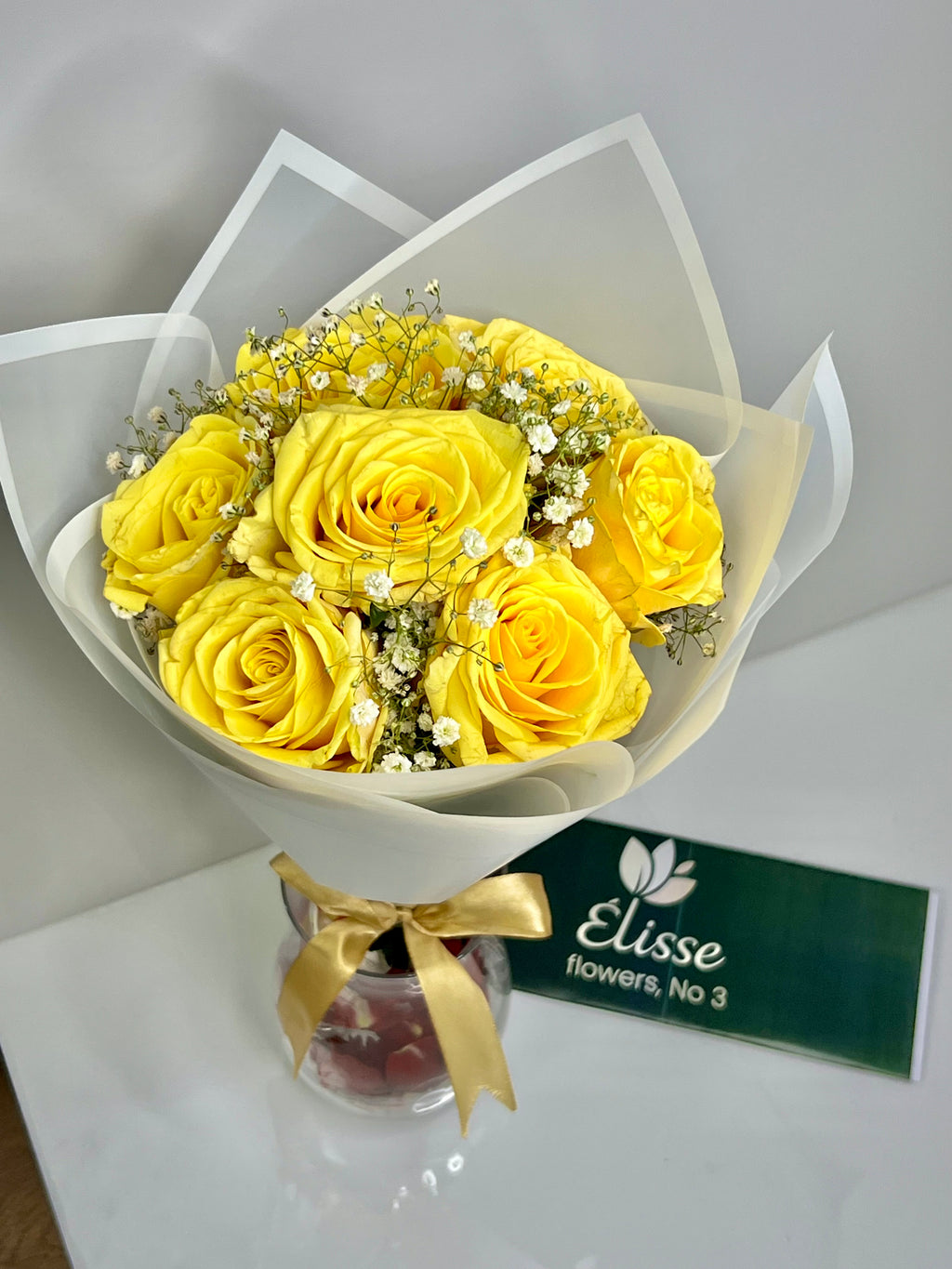 Yellow Roses in White Wrapping