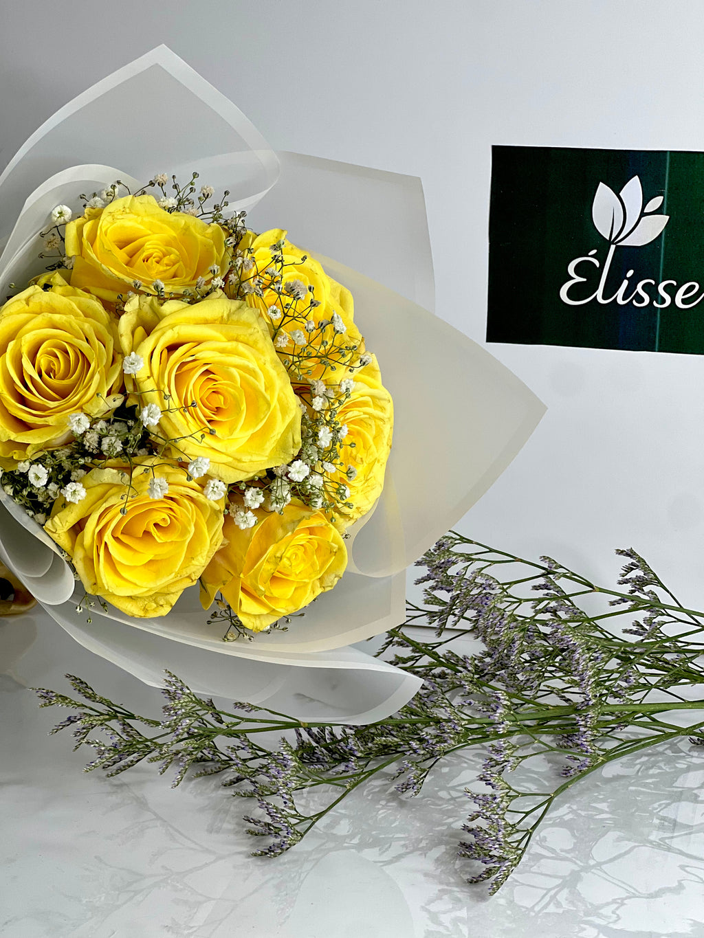 Yellow Roses in White Wrapping